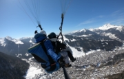 Rémi-Lou with a passenger above the mountains