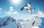 Image of a snowboarder in flight