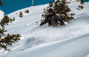 Image of a skier going downhill